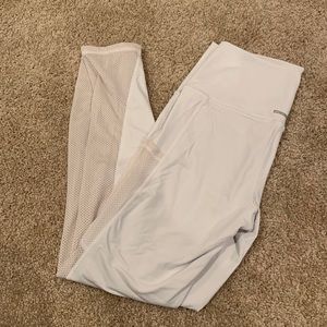 White leggings with cut outs in back